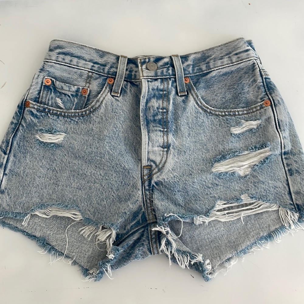 Levi’s 501 denim shorts; size 25; 2.5 inch inseam; medium/light wash